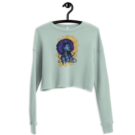 Crop Sweater or Long sleeve crop top with a graphic design on the center of the top.